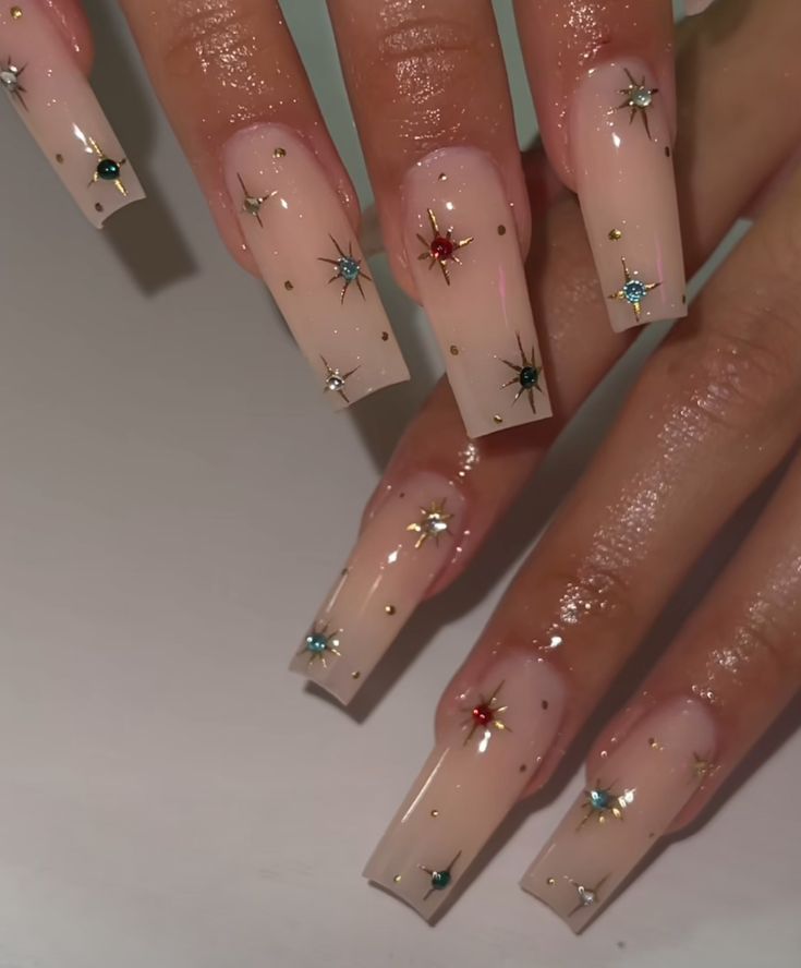 New Years Nail Designs Medium, Fireworks Nails New Years, New Years Nail Inspo Simple, Star Nail Acrylic, Star Nail French Tip, New Years Nails Square Long, New Years Square Acrylic Nails, Nail Ideas With Cross Charms, Cute Simple Nails With Gems