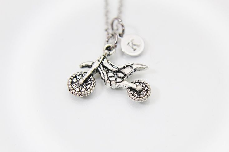 Dirt Bike Necklace, Love Motocross Necklace, Dirt Bike Number Plate Necklace, Off Road Bike Charms, Motocross Number Necklace, Personalized HOW TO ORDER 1) Select the quantity 2) Select stamp 3) Add to cart DESCRIPTION ♥ Stainless steel chain about 18 inches ♥ Stainless steel/brass 8- 10 mm. ♥ Zinc Base Alloy Pendant, 18mm x 23mm ♥ Raw materials the USA and international sourcing. ♥ I do not include invoices in any packages unless requested. ♥ Handmade to order, please allow 2-5 days for us to m Nickel-free Silver Initial Pendant Charms, Silver Nickel-free Initial Pendant Charms, Personalized Small Silver Charm Necklaces, Silver Personalized Charm Necklace, Silver Charms With Adjustable Chain For Everyday, Personalized Silver Charms For Everyday, Personalized Silver Dangle Charm Necklaces, Silver Initial Pendant Charm Necklace Nickel Free, Small Silver Nickel-free Charm Necklace