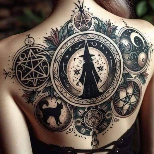 the back of a woman's shoulder with an image of a witch on it