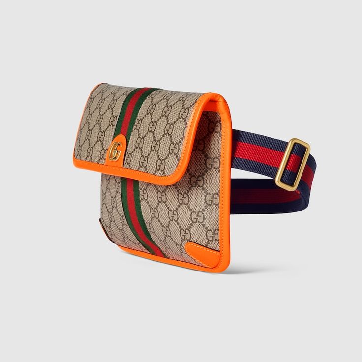 "Find GUCCI Ophidia Small Belt Bag Gg Canvas on Editorialist. Gucci heritage meets contemporary design with the continuation of Ophidia. With its two archival details, the Web and the Double G hardware, the line takes on new shapes and dimensions in the Pre-Fall collection. This men's belt bag denotes the nuances of the line. The waist belt strap can be adjusted for versatile ways to wear. Beige and ebony GG Supreme canvas, Brown leather trim, Gold-toned hardware, Green and red Web, Cotton linen Small Belt Bag, Hang Bag, 2024 Wardrobe, Purse Game, Timeless Bags, Small Belt, Red Web, Gucci Ophidia, Best Purses