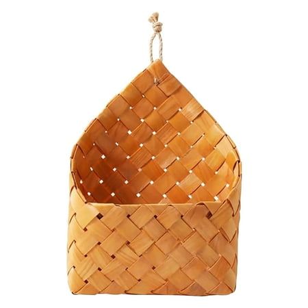 a basket hanging from a rope on a white background