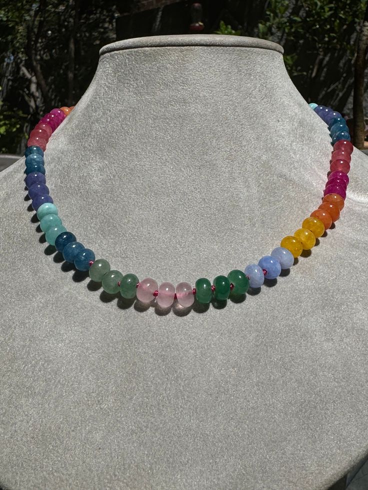 Embrace the ethereal beauty of a spectrum of colors with this stunning Ethereal Spectrum Gemstone Necklace. Featuring a harmonious blend of various gemstones, this necklace is perfect for those who love unique, eye-catching jewelry. Each bead is carefully selected to create a balanced and beautiful piece that will complement any outfit. Rainbow Natural Stones Round Beads Necklaces, Rainbow Crystal Necklaces With Round Gemstone Beads, Rainbow Rondelle Necklace For Gift, Rainbow Rondelle Necklace Gift, Rainbow Gemstone Beaded Necklaces For Healing, Multicolor Single Strand Jewelry For Healing, Rainbow Round Beads Necklace For Healing, Multicolor Crystal Necklaces With Gemstone Beads, Multicolor Round Crystal Necklaces With Gemstone Beads