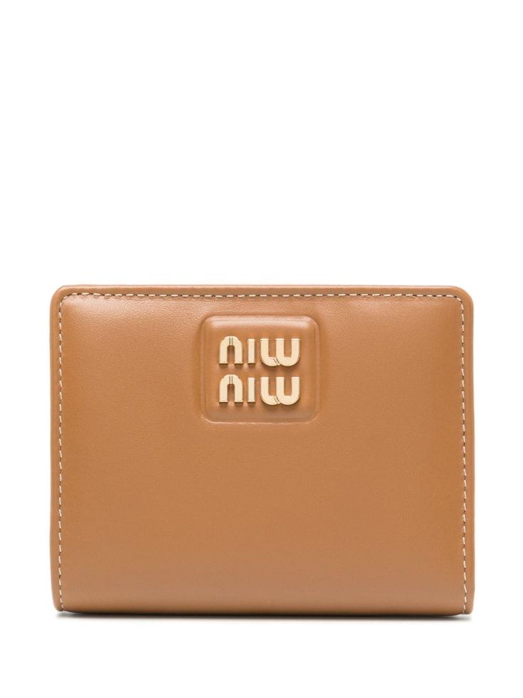 caramel brown leather gold-tone logo lettering bi-fold design press-stud fastening internal logo stamp internal card slots coin pocket Miu Miu Wallet, Caramel Brown, Press Studs, Logo Stamp, Letter Logo, Miu Miu, Purse Wallet, Leather Wallet, Brown Leather