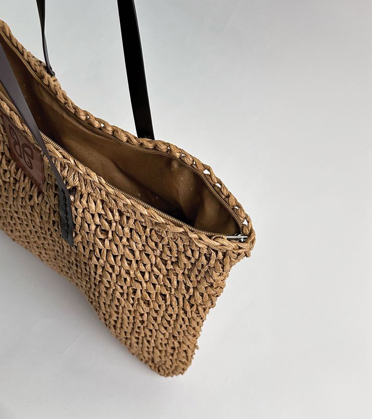 Embark on a journey of coastal elegance with our stunning Aria woven raffia tote, embodying the essence of Mediterranean living. Meticulously handcrafted with detailed raffia weaving and featuring sturdy brown handles, this tote exudes an aura of refined sophistication. Embrace the enchanting spirit of the Mediterranean with this indispensable accessory, a harmonious fusion of craftsmanship and style destined to captivate admirers. Raffia Weaving, Mediterranean Living, Italy Gift, Coastal Elegance, Woven Raffia, Comfortable Sneakers, Flat Sneakers, The Mediterranean, Espadrilles Wedges