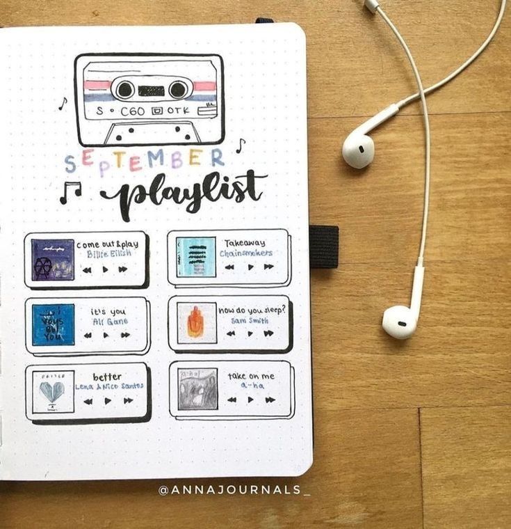 a notepad with an image of a radio and headphones on top of it