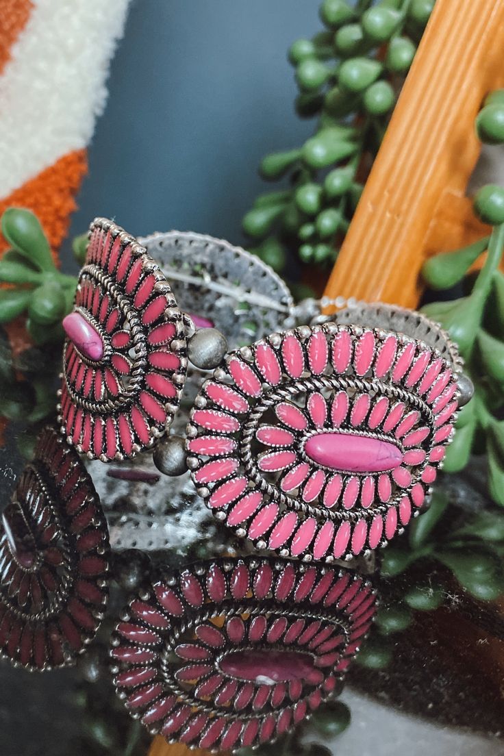 Dress up your outfit with this pink concho western bracelet! This bracelet pairs perfectly stacked with other or worn alone. Throw it on with a graphic tee to dress it up, or wear it with a cute romper or dress to a country concert! stretch bracelet pink + silver Southern Roots Boutique112 W Main St Paragould, AR Pink Western Jewelry, Pink Bohemian Bracelets For Spring, Adjustable Pink Bohemian Cuff Bracelet, Bohemian Adjustable Pink Cuff Bracelet, Pink Bohemian Adjustable Cuff Bracelet, Adjustable Pink Jewelry For Festivals, Pink Trendy Jewelry For Festivals, Trendy Pink Festival Jewelry, Pink Adjustable Cuff Bracelet