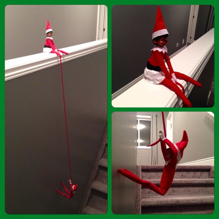 the elf is climbing up the stairs with his legs in the air, and he's wearing a red hat