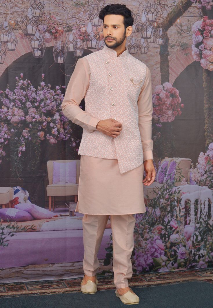 Readymade Art Silk Kurta in Peach This Collar Neck and Full Sleeve attire is Allured with Buttons and Thread Work Available with a Peach Art Silk Aligarhi Pant and a Peach Satin Asymmetric Nehru Jacket Do note: Footwear shown in the image is for presentation purposes only. Half to one inch may vary in measurement. (Slight variation in actual color vs. image is possible) Kurta Pajama With Jacket, Engagement Dress For Groom, Peach Color Dress, Wedding Kurta For Men, Peach Saree, Designer Kurta, Kurta Men, Latest Bridal Dresses, Men's Ethnic Wear