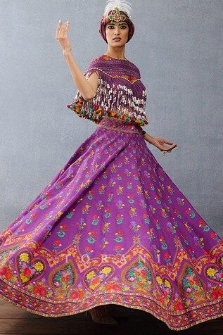 Purple attached cancan lehenga with mughal, floral, rose print all over. Paired with tassel sequin embellished blouse. - Aza Fashions Traditional Festival Sets With Tassels, Festive Pink Sharara With Tassels, Festive Pink Tassel Sharara, Bohemian Style Set With Tassels And Traditional Drape, Bohemian Sets With Tassels For Navratri, Bohemian Tassel Set For Navratri, Bohemian Tassel Dresses For Navratri, Bohemian Purple Sets With Dupatta, Bohemian Purple Set With Dupatta