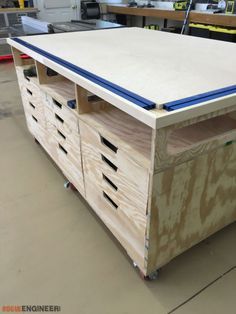 an unfinished workbench in a garage