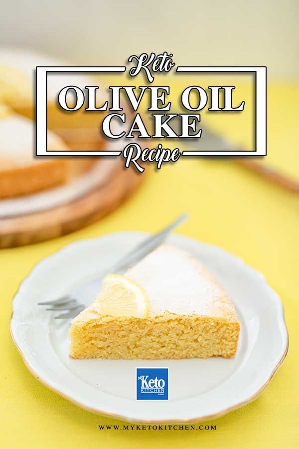 a piece of cake on a plate with a knife and fork in front of it that says keto olive oil cake recipe