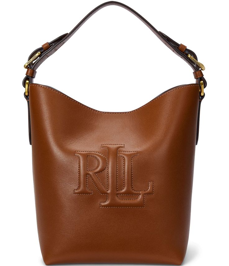 From Lauren Ralph Lauren&#x2C; the Medium Witley Leather Bucket Bag features:Leather shellCotton liningMagnetic snapped closureOversize “LRL” bombé logo at the flap“Lauren Ralph Lauren est. 1967”–engraved metal plaque on the interiorZip pocket and a slip pocket at the interiorTop handle with approx. 7.5" drop lengthRemovable&#x2C; adjustable crossbody strap with a 21" maximum dropApprox. 10" H x 11.5&quot Designer Ralph Lauren, Ralph Lauren Leather, The Medium, Leather Bucket Bag, Leather Bucket, Sneaker Wedge, Short En Jean, Wimbledon, Women Accessories Bags