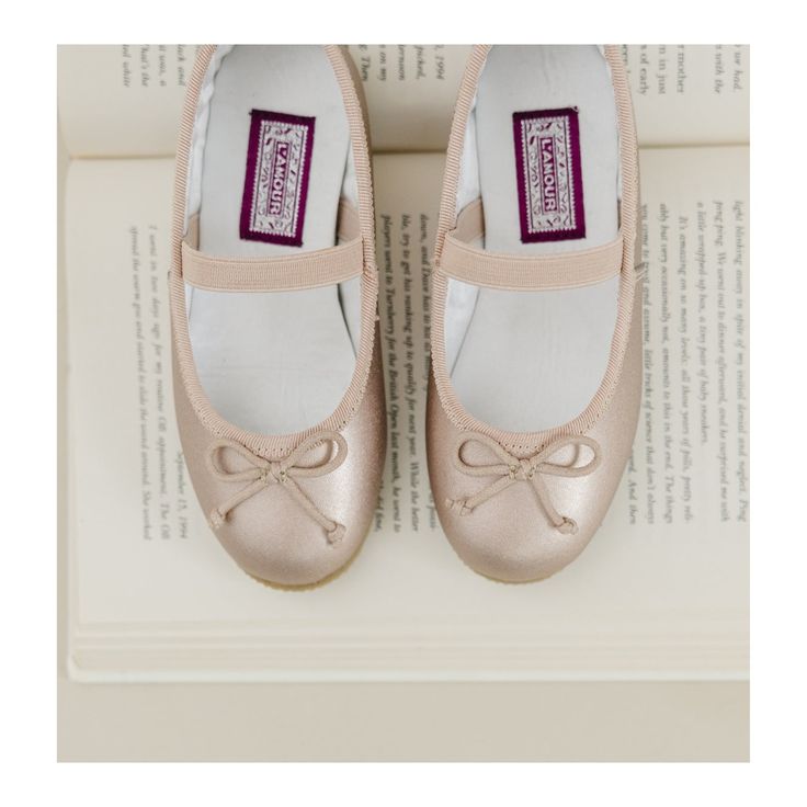 Our classic ballet flat, the Alia, is perfect for the off duty dancer who loves all things ballet. .. Perfect for day to night, weekday to weekend, this flat will have her feeling light on her toes. Please note for sizes 13 and up, there is no elastic cross strap The fine print Soft leather upper Matching tonal bow, binding & elastic Rubber sole Toddler sizes 4 - 12 have elastic strap; sizes 13 - 3 have no strap Whole sizes Toddler 4 - Kid 3 Fitted Ballet Flats For Dance, Classic Closed Toe Dance Shoes For Spring, Fitted Round Toe Ballet Flats For Summer, Spring Fitted Closed Toe Dance Shoes, Summer Fitted Ballet Flats With Round Toe, Closed Toe Ballet Dance Shoes For Dance Class, Fitted Almond Toe Ballet Flats With Rubber Sole, Flexible Closed Toe Dance Shoes, Spring Ballet Flats With Soft Sole