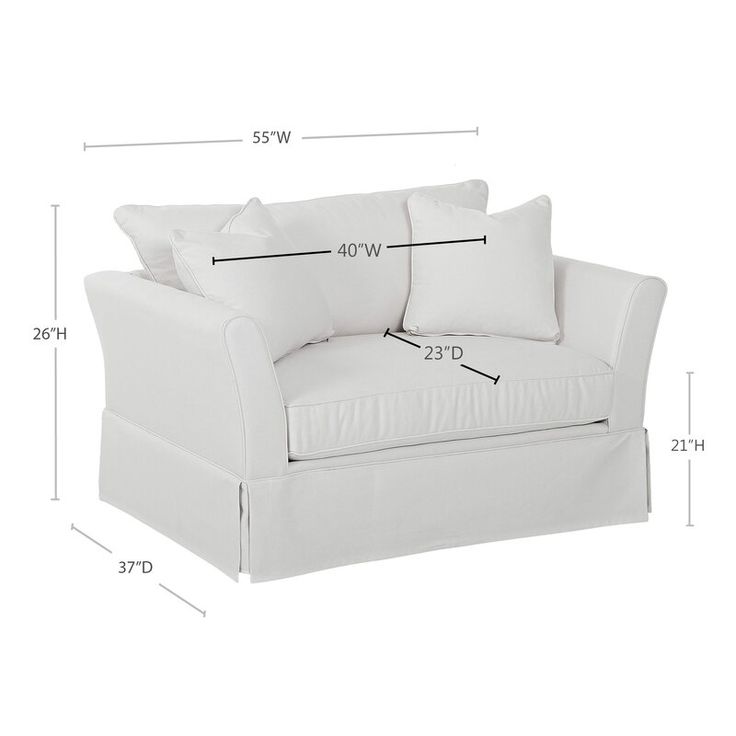 a white couch with two pillows and measurements