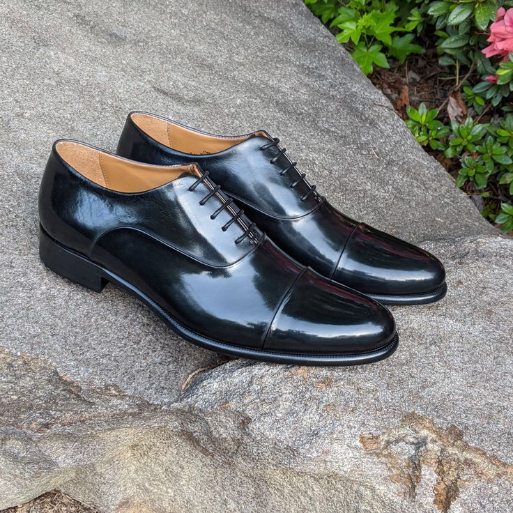 A modern take on a classic design. The cap toe oxford is the quintessential business shoe. However with the hidden stitching and folded seams we have created a sleeker, more elegantly flowing shoe. Add in one of the hand dyed patinas and you have a business shoe that is anything but boring. Hand painted full grain Italian leather Recraftable Blake stitch construction Available in any color including unfinished crust leather for a truly custom patina. Hidden Stitch, Business Shoe, Formal Shoe, Oxford Shoes Men, Business Shoes, Derby Hats, Classic Shoes, Formal Shoes, Italian Leather