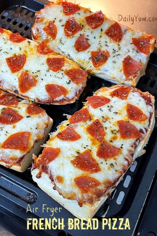 four slices of pepperoni pizza sitting on top of an open grill pan with the words air fryer french bread pizza