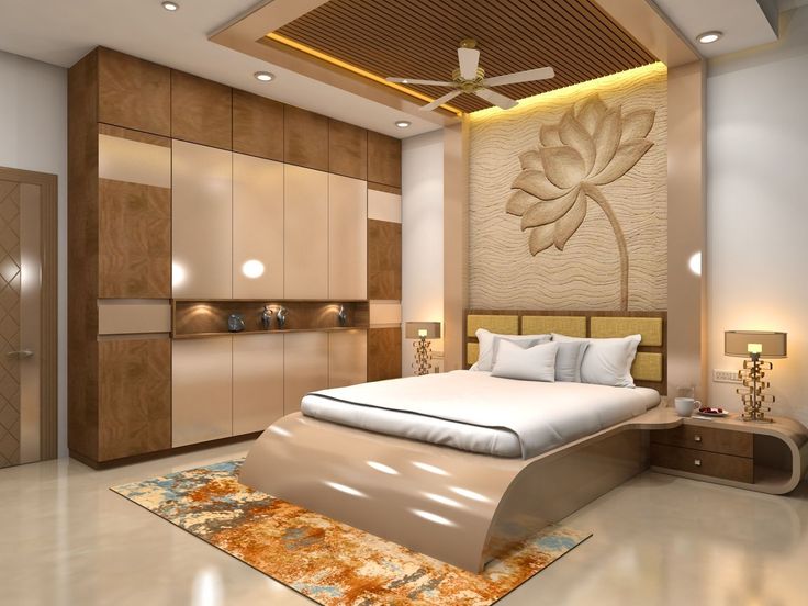 a bedroom with a large bed and wooden cabinets