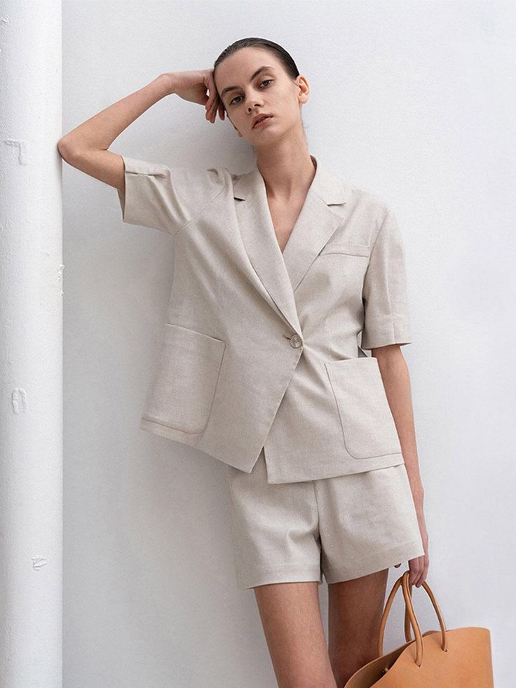 Editor's NotesThe summer patns is cut from herringbone patterned linen and upgrades your summer outfit- Classic shorts- Matte cow horn button- Button closure with zip flt- Side pockets- Set up with Herringbone Puffed Half Sleeve JacketMeasuremets(in.)- S:       Waist     27.4in.,        Hip     37.1in.,        Length     14.6in.              - M:        Waist     29.4in.,        Hip     39in.,        Length     15in.              - L:        Waist     31.9in.,        Hip     41in.,        Length     15.4in.  *Model size- Height 176cm-        Bust     31.2in.,        Waist     24.5in.,        Hips     33.9in.  Composition & Care- 55% Polyester, 14% Linen, 28% Cotton, 3% Polyurethane- Dry cleaningDesigner- Made in Korea- by RE RHEE Summer Workwear Shorts With Patch Pockets, Beige Linen Shorts For Work, Neutral Linen Shorts With Pockets, Summer Workwear Shorts With Pockets, Beige Shorts With Welt Pockets For Spring, Summer Workwear Bottoms With Buttoned Pockets, Summer Workwear Shorts With Welt Pockets, Beige Patch Pocket Shorts For Summer, Neutral Workwear Shorts With Pockets