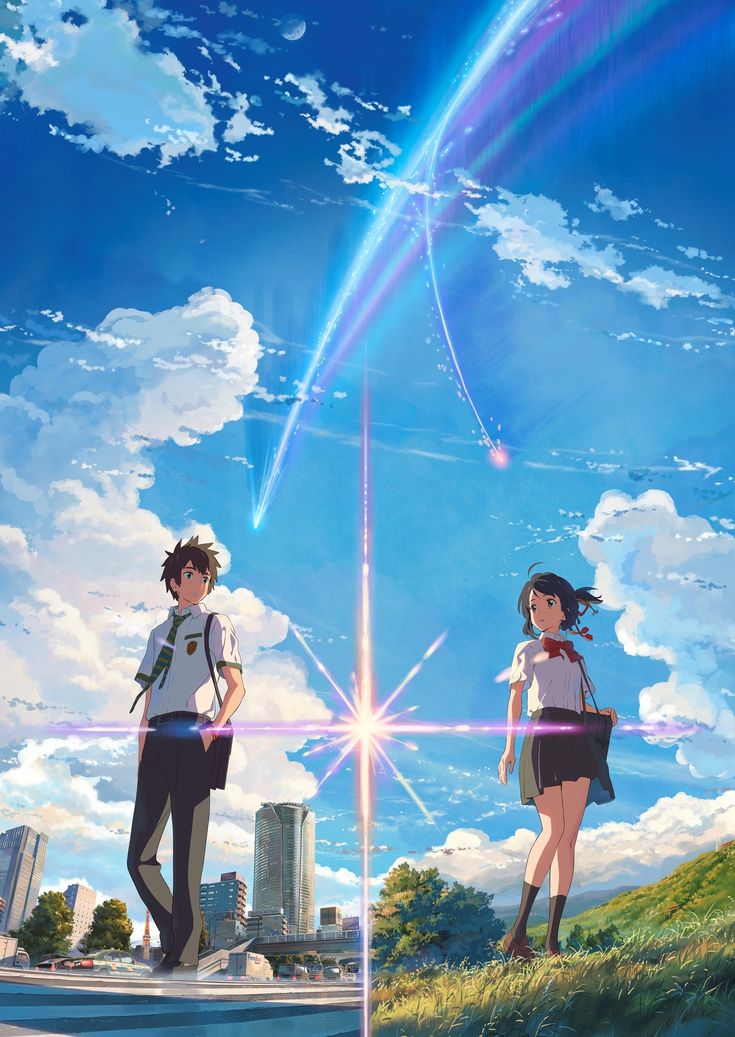 two people standing in front of a blue sky with clouds and the sun shining behind them