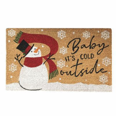 a door mat that says baby it's cold outside with a snowman on it