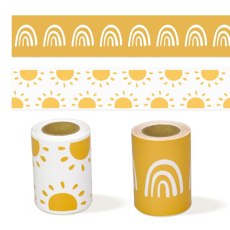 two rolls of yellow and white washi tape next to each other on a white background