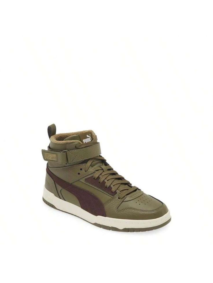 A high-top profile adds a cool and edgy element to a faux-leather sneaker complete with branded logos for signature Puma style. 
Cushioned EVA footbed with arch support 
Textile faux-leather upper/synthetic lining and sole 
Imported 
PUMA has received the Fair Labor Association accreditation, which signifies that the company has effective systems and procedures in place to successfully uphold fair labor standards throughout its supply chains, including strategies and tools to address and improve Green Leather High-top Sneakers For Sports, Outdoor Leather Basketball Shoes With Rubber Sole, Leather Mid-top Basketball Shoes For Outdoor, Sporty Green Leather High-top Sneakers, Casual Leather Basketball Shoes For Streetwear, Outdoor Leather Lace-up Basketball Shoes, Puma Logo Sneakers With Round Toe, Green Leather High-top Sneakers Casual Style, Casual Green Leather High-top Sneakers