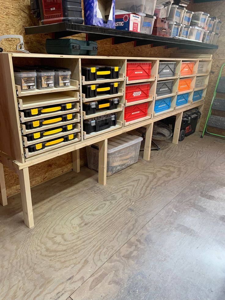 a workbench with lots of drawers and tools