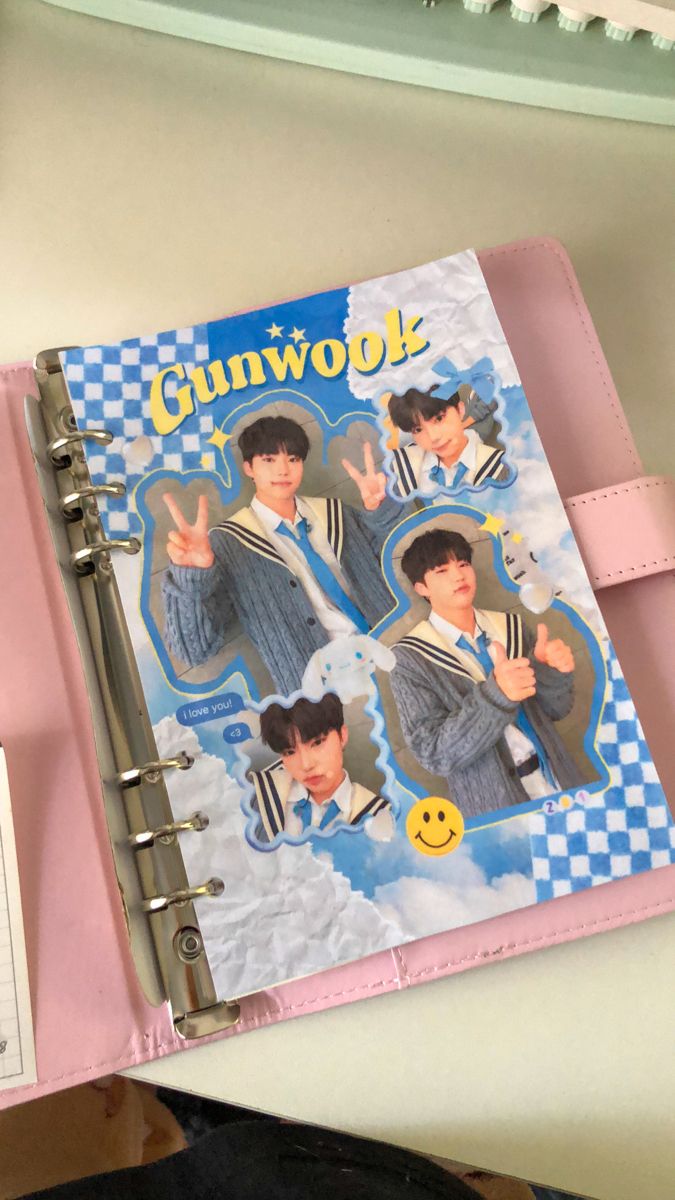 a binder with an image of two young men on it and the words gumwook