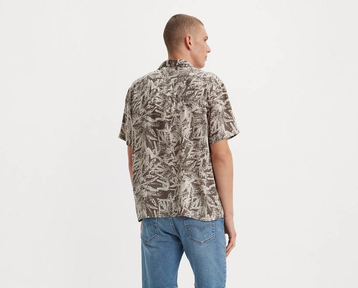 No summer line-up's complete without our Sunset Camp Shirt. It breathes the relaxed vibe that summer's all about, but is slightly more stepped-up than a T-shirt. A soft, lightweight and breathable camp shirt Cut with a roomy fit We made this garment with TENCEL™ Lyocell, a soft fiber sourced from wood. TENCEL™ is a trademark of Lenzing AG. Casual T-shirt For Outdoor Summer Activities, Casual Summer T-shirt For Outdoor, Casual T-shirt For Outdoor Spring Activities, Casual T-shirt For Spring Outdoor Activities, Casual T-shirt For Outdoor Spring Events, Casual Spring Outdoor Tops, Spring Camp Collar T-shirt With Relaxed Fit, Casual Short Sleeve Camp Shirt With Graphic Print, Relaxed Fit Short Sleeve Shirt For Summer Vacation