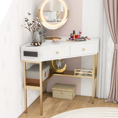 there is a vanity with a mirror on it and some drawers in front of it