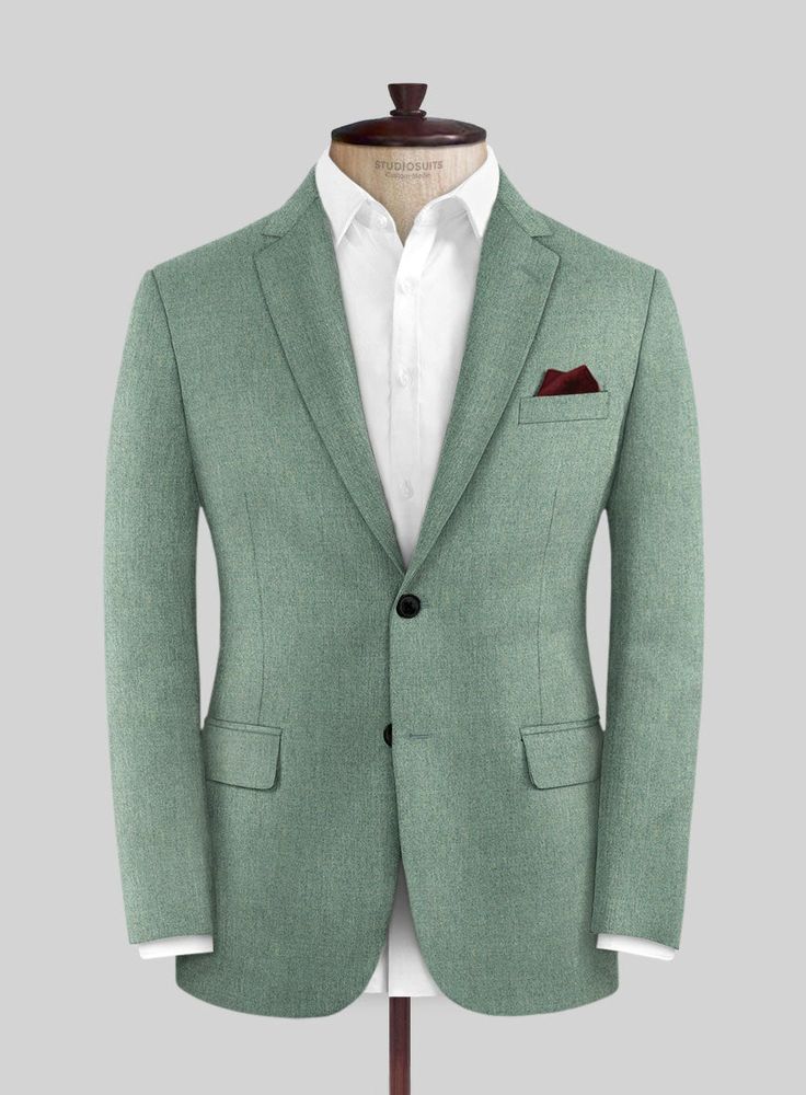 In search of comfortable outerwear? Look no further than the Italian Squito Beetle Green Wool Jacket. Crafted from pure merino wool, its brushed finish makes it seasonless and adds a touch of luxury to your layering game. In addition, this jacket's  unique solid green texture makes it a standout piece in your wardrobe. 
 
 
Look features a 2 button jacket with notch lapels, h orn royal black  buttons, single vent and two cuff buttons.   
 You can change the look during customization if required. Elegant Green Semi-formal Blazer, Elegant Fitted Green Blazer, Fitted Dark Green Business Suit, Elegant Green Three-piece Suit With Notch Lapel, Elegant Green Slim Fit Suits, Elegant Green Suit With Notch Lapel, Tailored Tweed Jacket With Suit Collar, Classic Dark Green Semi-formal Suits, Formal Dark Green Blazer With Notch Lapel