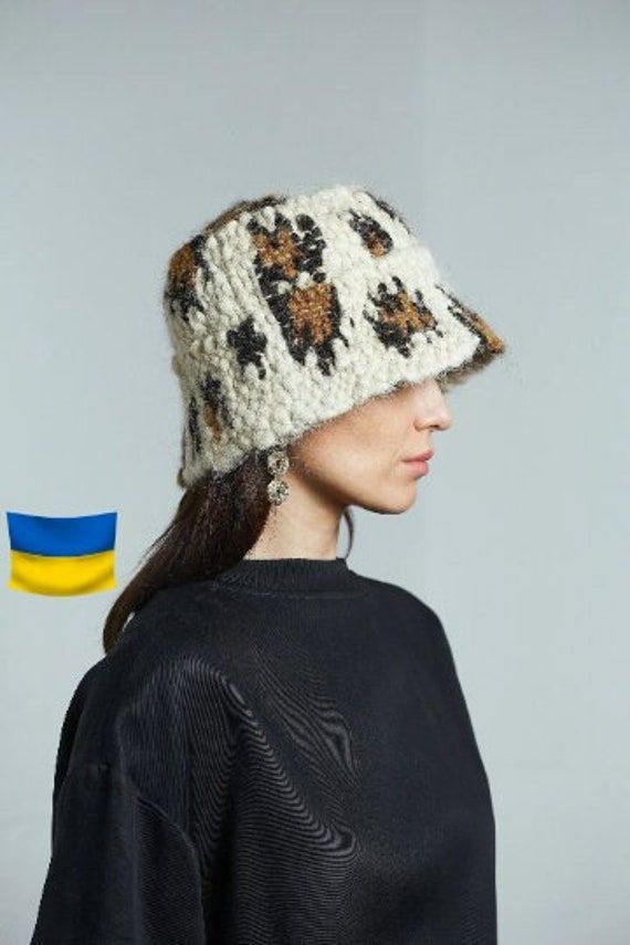 Hover (winter hat) is a unique handwoven wool hat with animal print. Leopard print, warm hat hand woven from wool. This panama is very warm, soft and comfortable to wear. The best solution for 2021. SIZES: S-M (56-57 cm) M-L (58-59 cm) L-XL (60-61 cm)(to order) Your size(to order, processing time of 2 weeks) Custom design is based on the basic pattern. Please note that it will take our team 10-15 days to produce the item, so be sure to add this time to the shipping time. MATERIAL: Made from 100% Bucket Hat Handmade, Remaking Clothes, Knitted Bucket Hat, Knit Bucket Hat, Wool Bucket Hat, Bucket Hat Winter, Winter Bucket Hat, Team 10, Bucket Hat Pattern