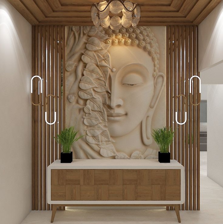 a room with a buddha statue on the wall