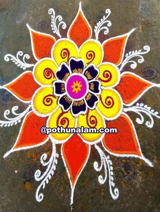 colorful flower design painted on the ground for diwaling and decorating with colors