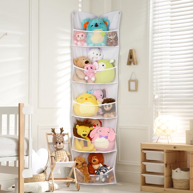 a toy storage rack in a child's room filled with stuffed animals and toys