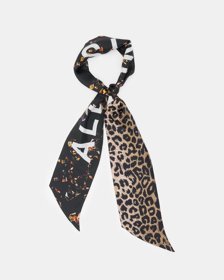 A scarf can bring a look together. The Kateri is a skinny shape with leopard print on one side and florals on the other. It's crafted from silk and printed with our signature logo - this luxury piece can be styled on your neck, as a tie, on your head or tied to your bag. This is versatility on a whole new level.  Skinny shape Silk fabrication AllSaints signature logo Floral and leopard print Multiple use scarf Logo Floral, Sweater Sale, Sweaters And Jeans, Jeans For Sale, Jacket Sale, Shirt Sale, All Saints, Signature Logo, Leopard Print