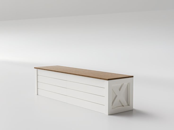 a white bench with a wooden top in an empty room