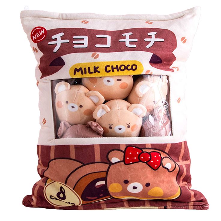 a pillow with three stuffed animals in it's packaging on top of the pillow