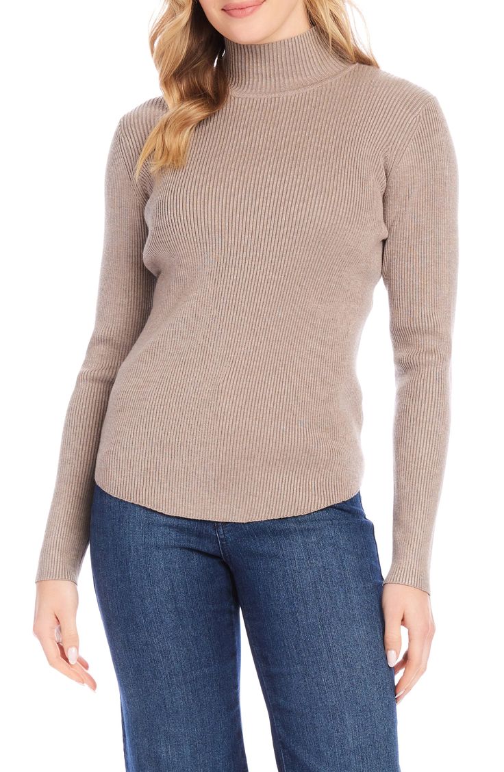 This stretchy top detailed with a cute mock neck makes a perfect layering piece. 25" length (size Medium) Mock neck Long sleeves 70% rayon, 30% nylon Hand wash, dry flat Imported Trendy Stretch Mock Neck Top For Workwear, Chic Mock Neck Top With Ribbed Turtleneck, Chic Stretch Knit Mock Neck Top, Spring Funnel Neck Sweater For Layering, High Neck Sweater For Layering, Solid Mock Neck Top For Layering, High Neck High Stretch Sweater For Layering, Stretch High Neck Top With Ribbed Neckline, High Stretch High Neck Sweater For Layering