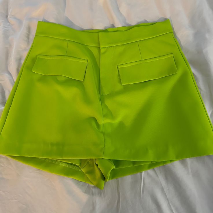 Never Worn. Was Too Small For Me. Adorable Bright Green Neon Skort. You Can See The Shorts In The Back - Skirt In The Front. Dress Up. Business Casual. Casual Green Short Skort, Fitted Party Shorts With Pockets, High-waisted Party Shorts With Pockets, Trendy High Waist Green Skort, Casual Green Skort With Short Inseam, Green Short Bottoms For Work, Green Summer Party Bottoms, Spring Party Skort With Pockets, Casual Party Skort With Pockets