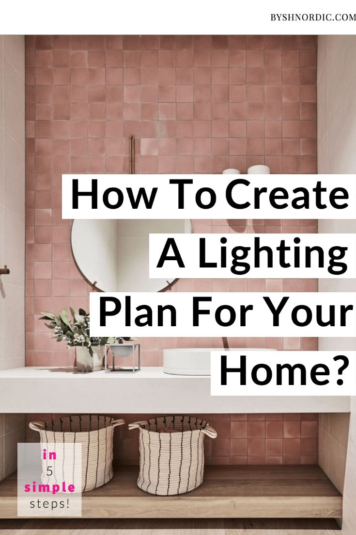 a bathroom with pink tiled walls and flooring, the words how to create a lighting plan for your home?