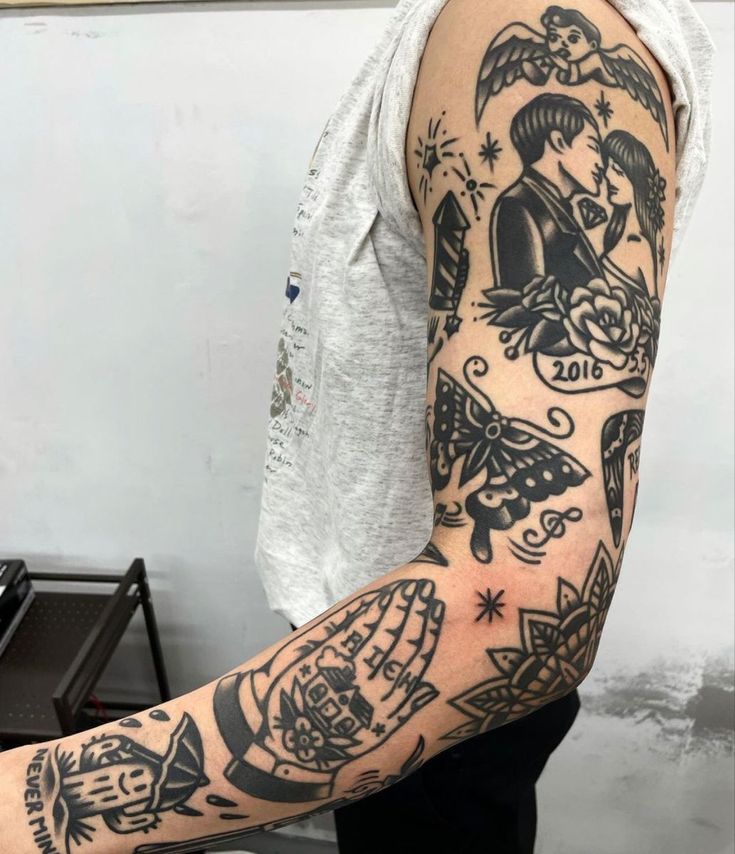 a man with a tattoo on his arm