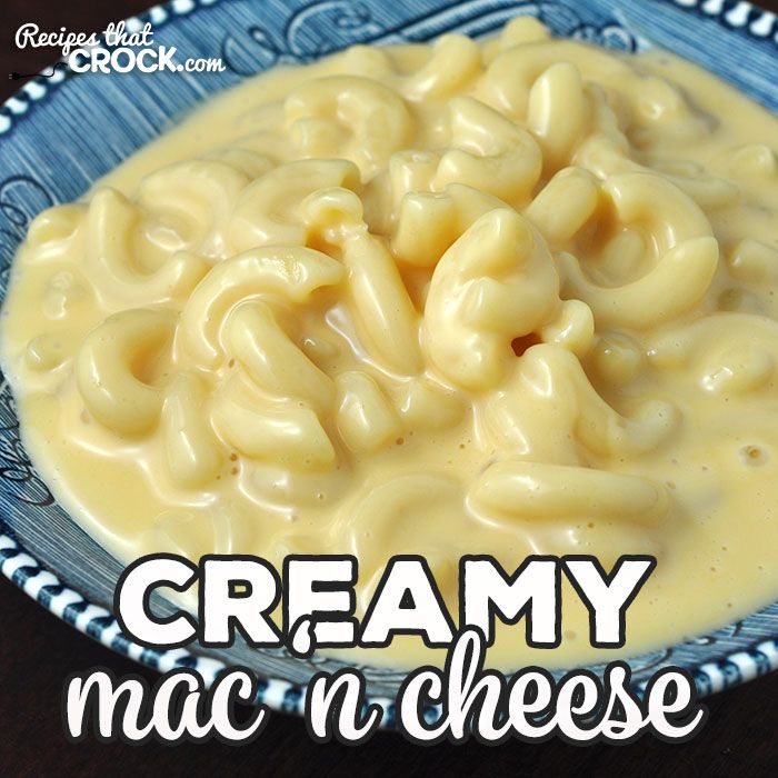 creamy mac n cheese in a blue bowl with the words creamy mac n cheese