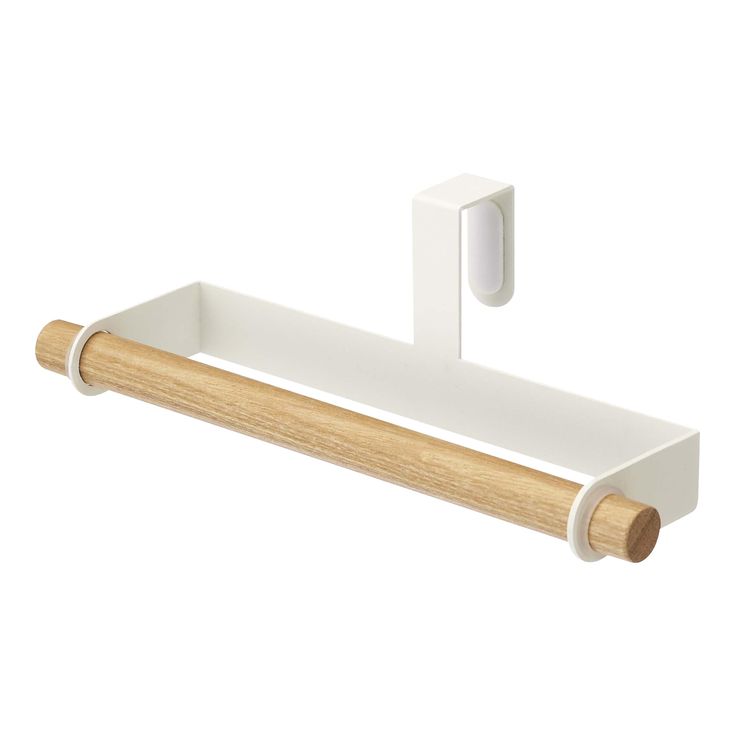 a white towel rack with two wooden handles