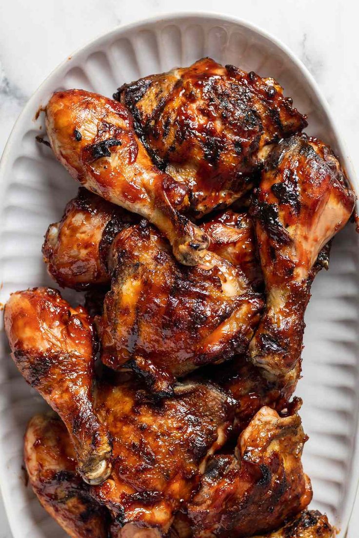 grilled chicken wings on a white plate