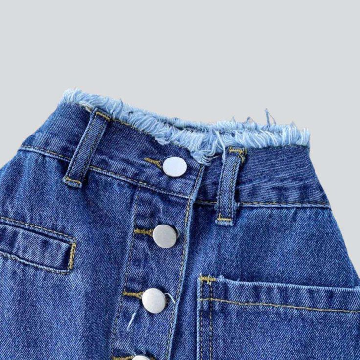 Introducing our 2023 Spring-Summer Collection ââ‚?the frayed waistband buttoned denim skirt. With its '90s-inspired design and high-waisted silhouette. this conventional stonewashed denim skirt will be your next summer staple.Why They're Your Next Summer Staple: Grunge Meets Glam: This denim skirt embodies rebellion and sophistication in one sleek package. Distressed Denim: With its distressed pattern. this skirt captures a raw. unfiltered essence. High-Waisted Fit: Its elevated-waisted silhouet Summer Straight Leg Skirt With Button Closure, High Waist Skirt With Frayed Hem, Trendy Spring Denim Skirt With Button Closure, Denim Button Skirt For Summer, Summer Denim Skirt With Buttons, Summer Denim Skirt With Button Closure, Cotton Denim Skirt With Button Zip Fly, Summer Cotton Denim Skirt With Button Closure, Denim Blue Cotton Skirt With Button Zip Fly