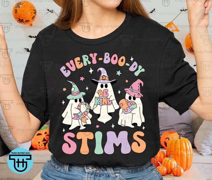 a woman wearing a t - shirt that says every booy slims