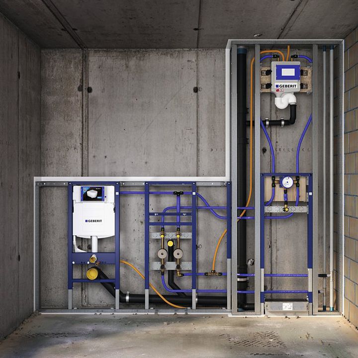 the inside of an industrial building with pipes and water heaters on it's sides