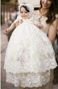 an image of a baby in a dress with the caption snowkiss on it