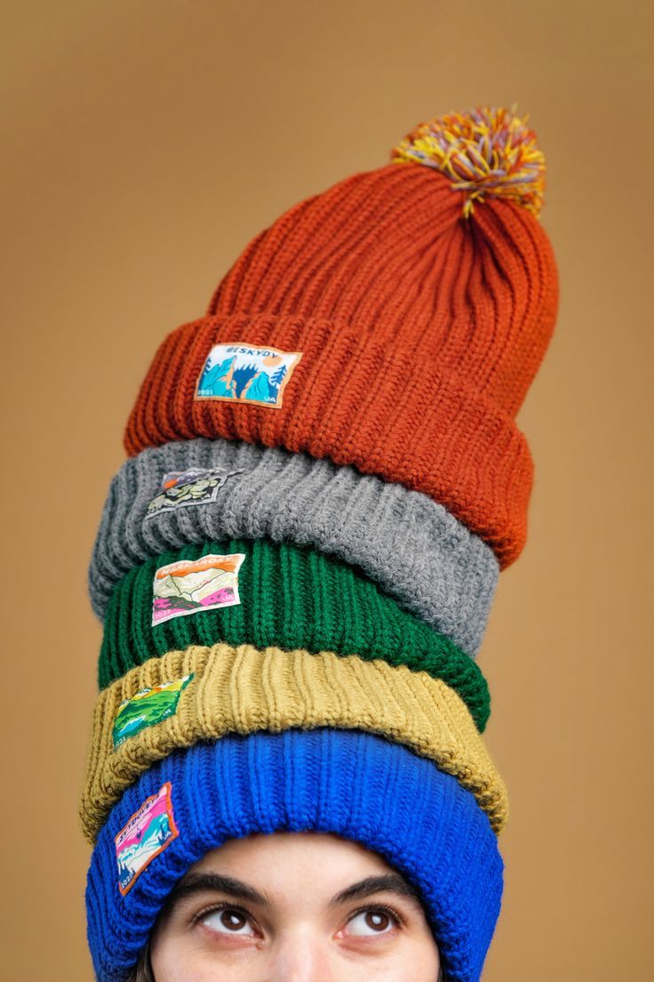 3-in-1 knitted pom-pom beanie.

Wear it with a single fold for a slouchy beanie look with minimalist dodo logo.
Double fold to get that snug warmth with a unique patch of Ukrainian mountain range.
Or tripple fold if you’re a hipster barista. Snow Photoshoot, Studio Photoshoot, Winter Cap, Slouchy Beanie, Scandinavian Christmas, Pom Beanie, Mountain Range, Photography Branding, Fashion Shoot